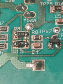 Close-up of a damaged circuit board with the capacitor C4 visible.