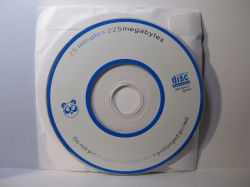 CD with Blue Print and Panda Graphic A white CD with blue print and a small panda graphic, inserted in a paper sleeve.