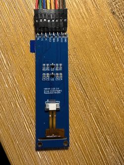 2.25 TFT ST7789P3 display module with jumper wires connected to header pins.