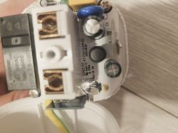 Interior of LIDL SAPM 1 A1 Smart Socket Interior of the LIDL SAPM 1 A1 smart socket with visible electronic components.