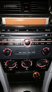 Mazda 3 2004r - Multi function audio system - świeci się na pomarańczowo