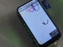 Wyświetlacz ESP32-C6 1.47 cala pokazujący test renderowania grafiki z informacją FPS i CPU