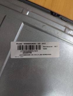 Barcode label on a metal casing showing model VE6560UNDS-2D-N12