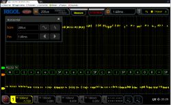 Rigol oscilloscope screenshot showing RS232-TX decoding with a visible character string