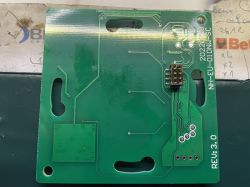 Green PCB board with visible tracks and a pin connector.