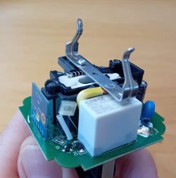 Interior of a Smart Plug with PCB Interior of a smart plug showing the PCB and components.