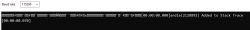 Screenshot of a terminal with unreadable text and baud rate set to 115200.