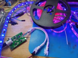 WS2812B LED strip connected to Zengge controller on a workbench