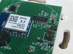 TYWE3S Switch Interior with Custom Pinout View of the interior of a switch based on the TYWE3S module with chip markings on the PCB.