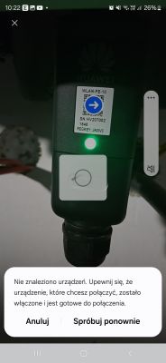 Huawei device with a label and illuminated LED indicator, along with a notification about no devices found on the phone screen.