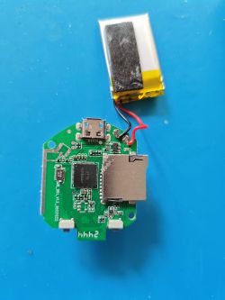 PCB with electronic components and a lithium-polymer battery on a blue background.