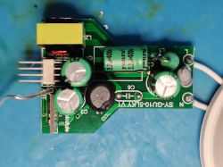 PCB of SY-GU10-5LKY1 bulb with capacitors and a transformer