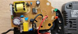 Interior of Open Charger JLH201261500G View of the interior of an open charger with visible electronic components.