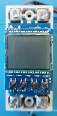 Electronic Device with LCD Screen and Buttons Electronic device with LCD screen and five buttons.