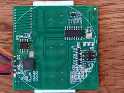 Circuit Board with Tuya T34 Chip Close-up of a circuit board with a Tuya chip and other electronic components.