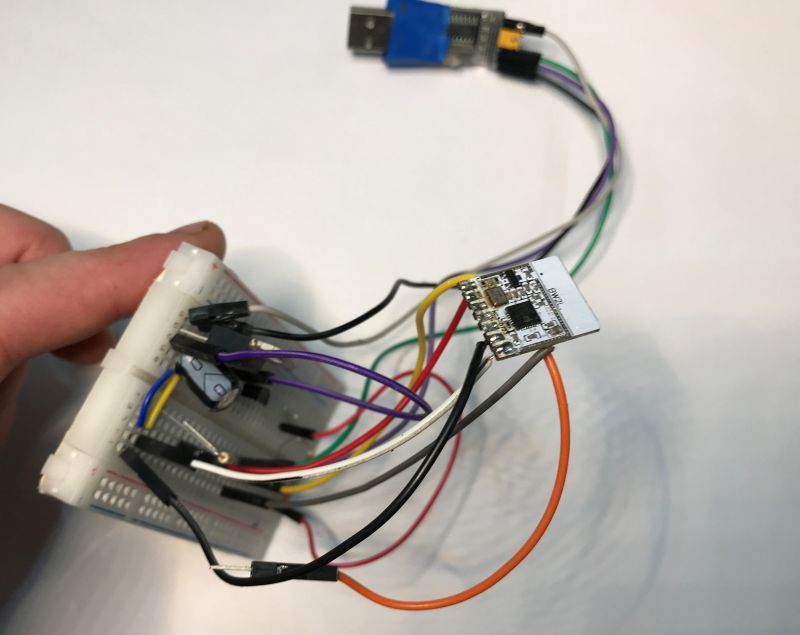 Prototype with a breadboard, wires, and electronic components.