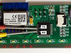 PCB with TX and RX labels on a chip and CB2S module.