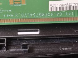 Close-up of Electronic Board with Markings Close-up of an electronic component with markings and a barcode.