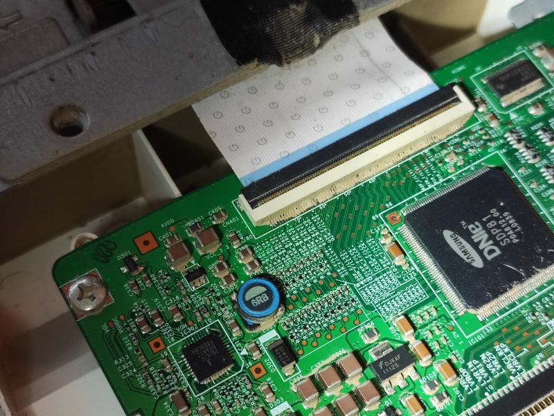 Interior PCB of a Samsung TV after Flooding Close-up of a PCB inside a Samsung LE32A330J1N TV.