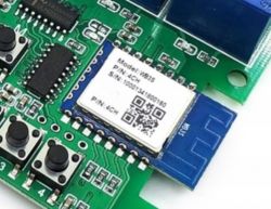 Close-up of a circuit board with WB3S module and buttons.