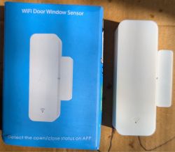 WiFi Door and Window Sensor Box and white WiFi door and window sensor