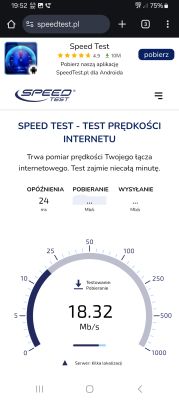 Ekran smartfona z wynikiem testu prędkości internetu, pobieranie 18,32 Mb/s, opóźnienie 24 ms.