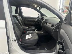 Car interior view showing the front seats.