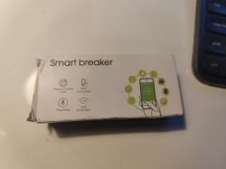 Box of a smart breaker from AliExpress with function icons.