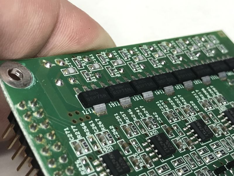 Close-up of PCB with BSP75N transistors and SMD components