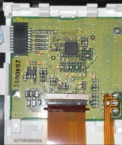 LCD Circuit Board with Components Detailed LCD circuit board with visible components and pins.