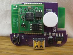 Close-up of an electronic circuit board with visible integrated circuit components.