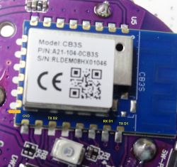 Close-up of CB3S electronic module with visible pins labeled GND, TX D2, RX D1, TX D1.