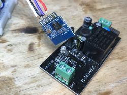 LXU402 relay module PCB with desoldered and soldered chip.