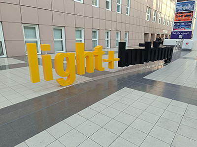 The light+building sign in front of a modern building.