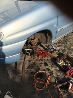Unscrewing Screws from Brake Yoke: Step-by-Step Guide for Citroen Berlingo Brake Disc Replacement Unscrewing Screws from Brake Yoke: Step-by-Step Guide for Citroen Berlingo Brake Disc Replacement