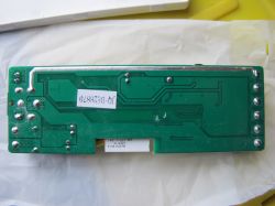 Bottom of Tuya SPI LED Controller PCB Bottom view of a green printed circuit board with solder marks.