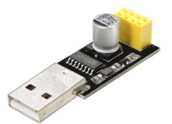 USB adapter module with capacitor and yellow pin header on a black PCB