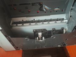 Inside of Brother Printer Inside view of Brother printer showing roller and paper guide mechanism.