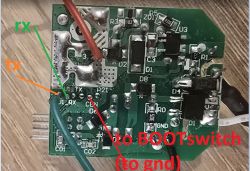 Close-up of a circuit board with labeled wires: RX, TX, and BOOTswitch to GND.
