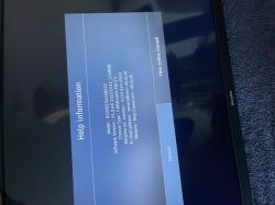 TV screen displaying model and technical support information.