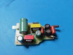 Printed circuit board with multicolored electronic components.