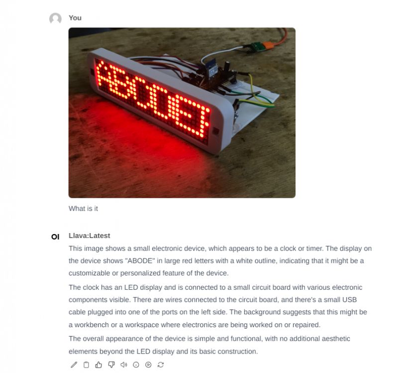 Electronic Clock with LED Display Electronic device with LED display and wiring.