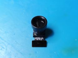 LT1757-OA 1.0 Mini Camera Module on Blue Background Mini camera module with a large lens and FFC ribbon labeled LT1757-OA 1.0 on a blue background.