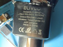 Label on ELMCO ELC‑SP02 smart plug Close-up of a black ELMCO smart plug label showing model ELC‑SP02, Zigbee 3.0, and 16A max load