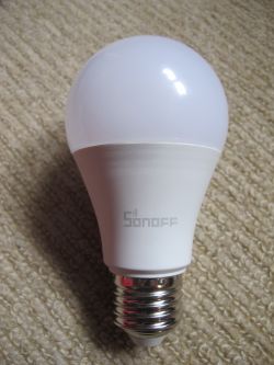Sonoff LED bulb on a carpet.