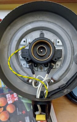 Inside of a Hoffek AK3502 electric kettle with exposed components.