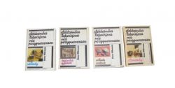 Cztery książki o elektronice ustawione obok siebie.