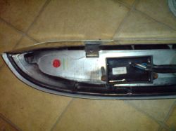 Opel corsa c 1.2 80km - Jak wymienić oświetlnie w tylnej lampie samochodu?