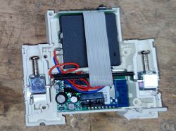 Interior of EARU Wi-Fi Relay EAWCBT Interior of an opened EARU Wi-Fi relay model EAWCBT with visible electronic components.