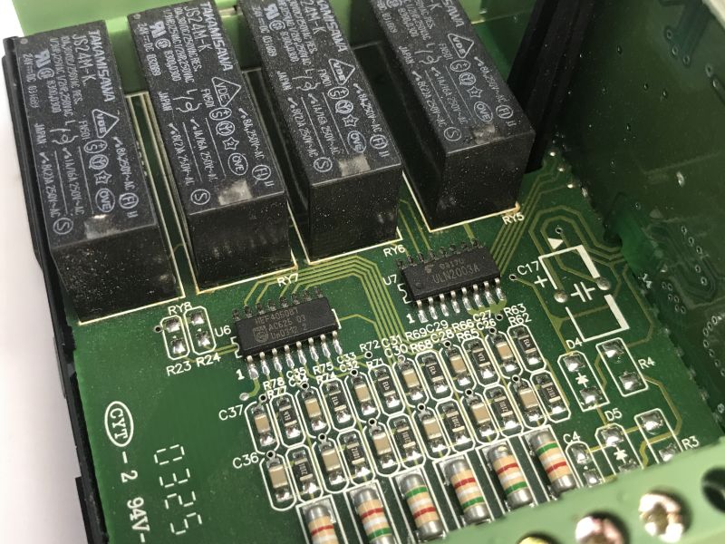 The interior of an old Schneider Electric SR1 A201BD programmable logic controller